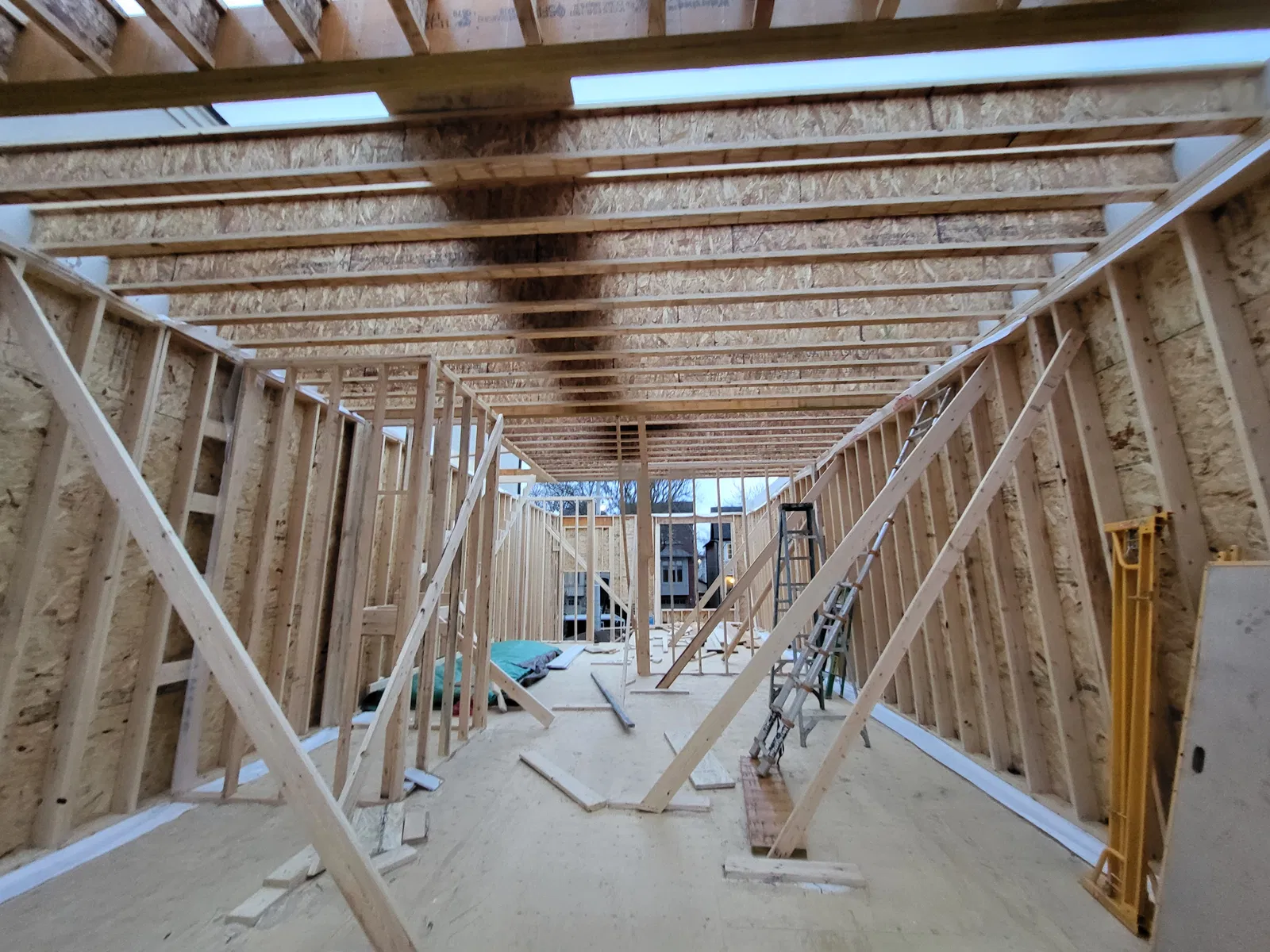 Custom home framing under construction by KA Constructors